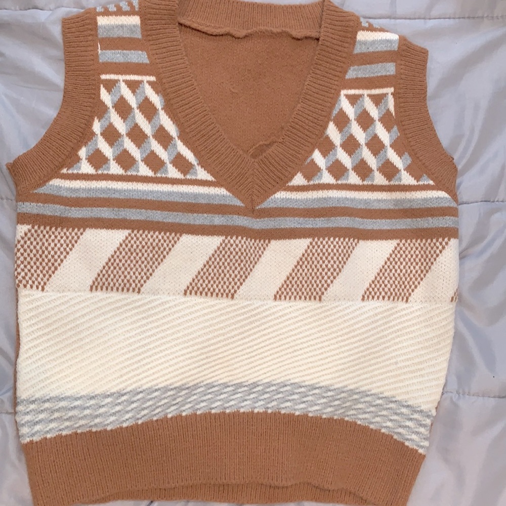 Brown vest with patterns